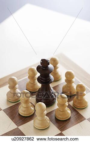 Chess game, black king surrounded by white pawns View Large Photo Image Stock Image - Chess game, black king surrounded by white pawns. Fotosearch