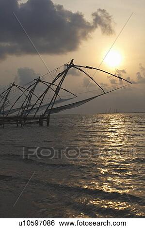 Chinese fishing nets (Cheena vala) of Fort Kochi (Fort Cochin) in the backwaters of Kerala View Large Photo Image Stock Photograph - Chinese fishing nets (Cheena vala) of Fort Kochi (Fort Cochin) in the backwaters of Kerala. Fotosearch