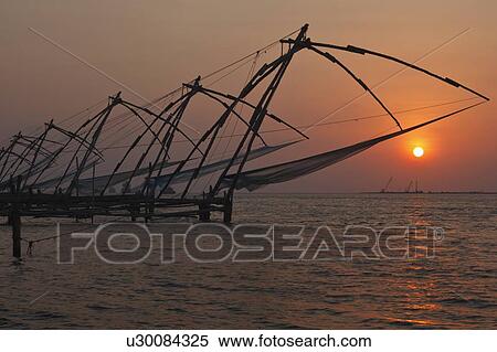Stock Photography - Chinese fishing nets (Cheena vala) of Fort Kochi (Fort Cochin) in the backwaters of Kerala. Fotosearch