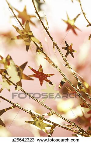 Christmas star decorations, close-up View Large Photo Image Stock Image - Christmas star decorations, close-up. Fotosearch