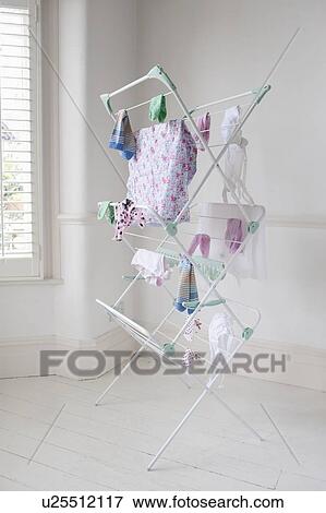 Stock Photo - Clothes on laundry airer, London. Fotosearch