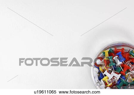 Stock Photography - Container of Push Pins, overhead view. Fotosearch