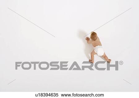 Crawling baby from above View Large Photo Image Stock Photography - Crawling baby from above. Fotosearch