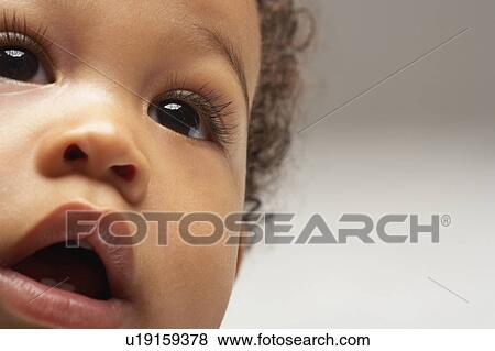 Stock Photo - Curious baby. Fotosearch