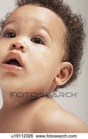 Stock Photograph - Curious Baby. Fotosearch
