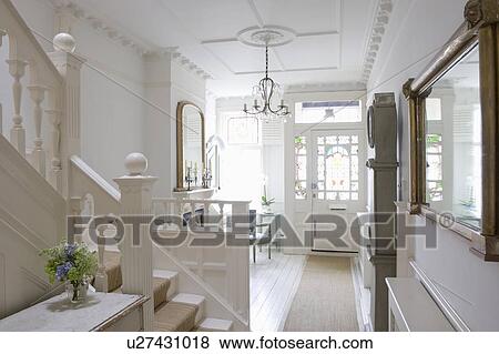 Stock Photo - Entrance hall with ceiling rose, London. Fotosearch