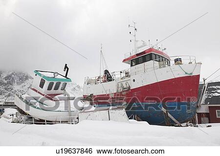 Stock Photograph - Fishing boats in Sund, Flakstadoya, Loftofen, Norway. Fotosearch