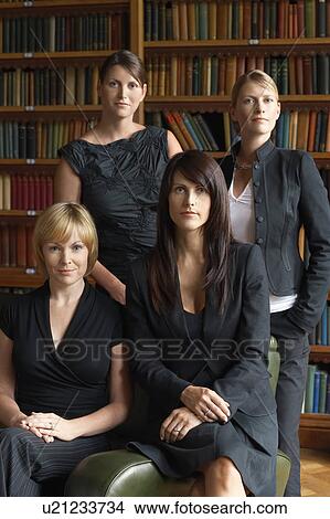 Four lawyers in library View Large Photo Image Picture - Four lawyers in library. Fotosearch