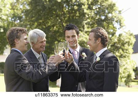 Four men toasting at wedding View Large Photo Image Stock Photography - Four men toasting at wedding. Fotosearch