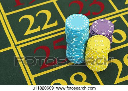 Gambling Chips on Roulette Table, close up View Large Photo Image Stock Photo - Gambling Chips on Roulette Table, close up. Fotosearch