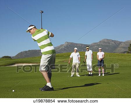 Golfer Teeing Off View Large Photo Image Picture - Golfer Teeing Off. Fotosearch