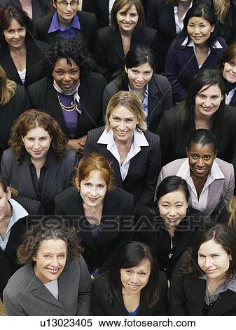 Group of business women looking up, portrait, elevated view, close up View Large Photo Image Stock Photography - Group of business women looking up, portrait, elevated view, close up. Fotosearch