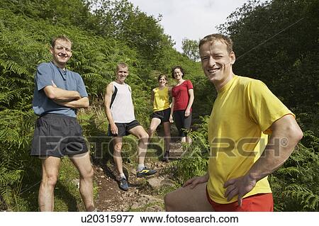 Group of hikers on walking track, portrait View Large Photo Image Stock Photo - Group of hikers on walking track, portrait. Fotosearch