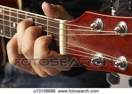 Guitarist Playing Acoustic Guitar View Large Photo Image Stock Photo - Guitarist Playing Acoustic Guitar. Fotosearch