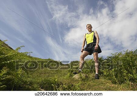 Hiker in countryside, portrait View Large Photo Image Stock Photograph - Hiker in countryside, portrait. Fotosearch