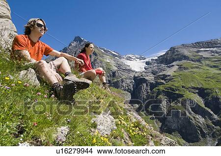 Hiking in the Val de Bagnes on the La Tsessette hiking trail, Canton du Valais View Large Photo Image Picture - Hiking in the Val de Bagnes on the La Tsessette hiking trail, Canton du Valais. Fotosearch