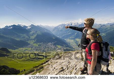 Stock Image - Hiking in Verbier in the Canton du Valais with views towards Italy and France. Fotosearch