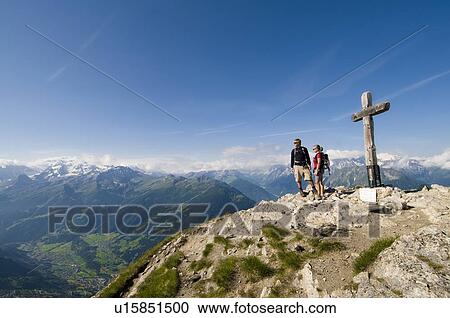 Hiking in Verbier in the Canton du Valais with views towards Italy and France View Large Photo Image Stock Image - Hiking in Verbier in the Canton du Valais with views towards Italy and France. Fotosearch