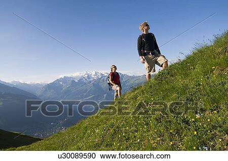 Stock Image - Hiking in Verbier in the Canton du Valais. Fotosearch