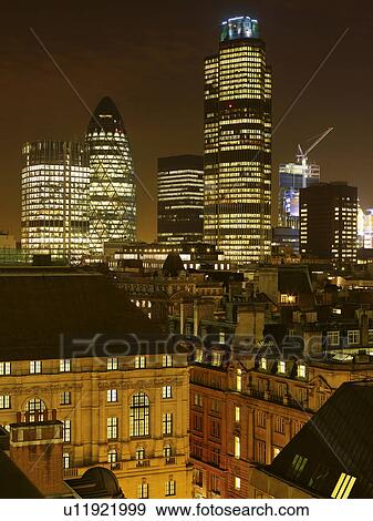 Stock Photo - Illuminated cityscape at night. Fotosearch