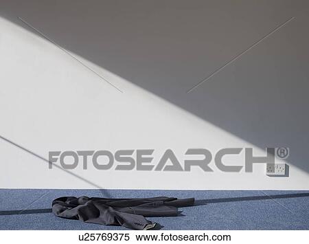 Stock Photography - Jacket on floor. Fotosearch