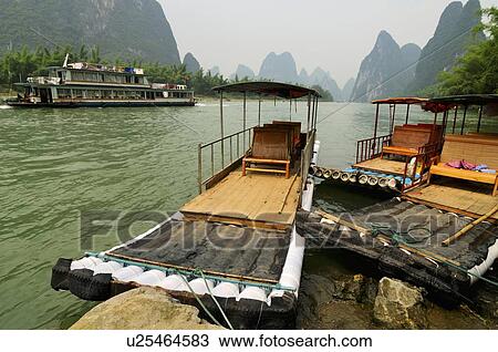 Li River and Karst hills in XinPing, Yangshuo, Guilin area, Guangxi province, China View Large Photo Image Stock Image - Li River and Karst hills in XinPing, Yangshuo, Guilin area, Guangxi province, China. Fotosearch