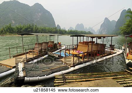 Li River and Karst hills in XinPing, Yangshuo, Guilin area, Guangxi province, China View Large Photo Image Stock Photography - Li River and Karst hills in XinPing, Yangshuo, Guilin area, Guangxi province, China. Fotosearch