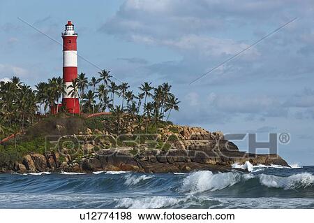 Stock Photo - Lighthouse in Kovalam, Kerala on the Arabian Sea. Fotosearch