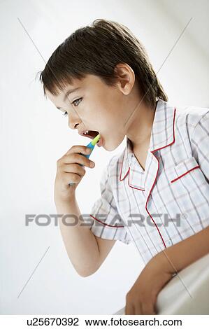 Little Boy Brushing Teeth in bathroom View Large Photo Image Stock Image - Little Boy Brushing Teeth in bathroom. Fotosearch