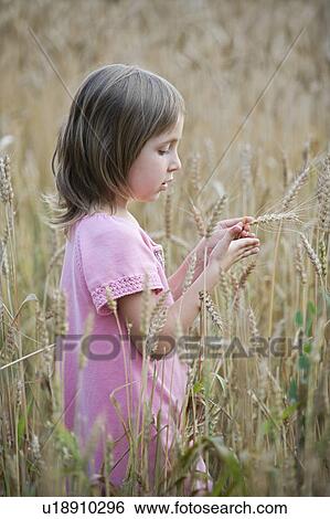 Little Girl in a Field View Large Photo Image Stock Photograph - Little Girl in a Field. Fotosearch