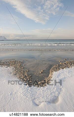 Stock Photo - Low tide near Ramberg in Flakstadoya on the Loftofen islands, Norway. Fotosearch
