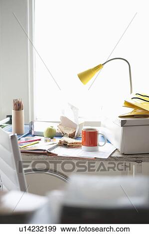 Lunchbreak at home office View Large Photo Image Stock Photo - Lunchbreak at home office. Fotosearch
