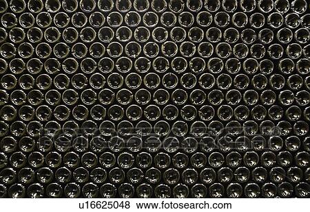 Lying down, arranged bottles of wine, bottom visible View Large Photo Image Stock Photo - Lying down, arranged bottles of wine, bottom visible. Fotosearch