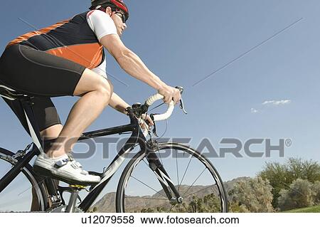 Male cyclist View Large Photo Image Stock Photo - Male cyclist. Fotosearch
