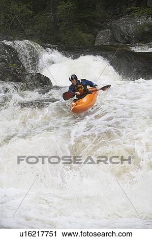 Man kayaking in river View Large Photo Image Stock Image - Man kayaking in river. Fotosearch