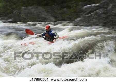 Man kayaking in river View Large Photo Image Stock Image - Man kayaking in river. Fotosearch