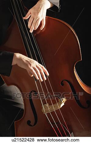 Man Playing Double Bass, close up of hands View Large Photo Image Stock Photo - Man Playing Double Bass, close up of hands. Fotosearch