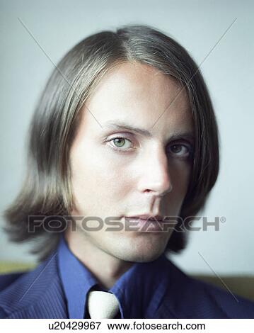 Stock Photo - Man Wearing Blue Suit and Shirt. Fotosearch