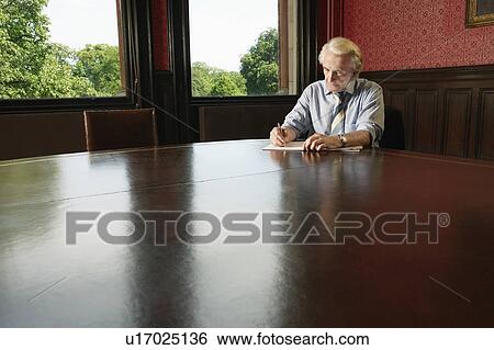Man Writing in Conference Room View Large Photo Image Stock Photograph - Man Writing in Conference Room. Fotosearch