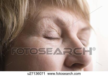 Mature woman, skin around eyes View Large Photo Image Stock Image - Mature woman, skin around eyes. Fotosearch