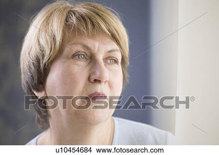 Picture - Mature woman with downturned mouth. Fotosearch