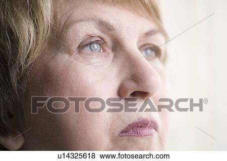 Mature woman with downturned mouth View Large Photo Image Stock Photo - Mature woman with downturned mouth. Fotosearch