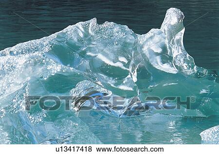 Melting ice on water View Large Photo Image Stock Photo - Melting ice on water. Fotosearch