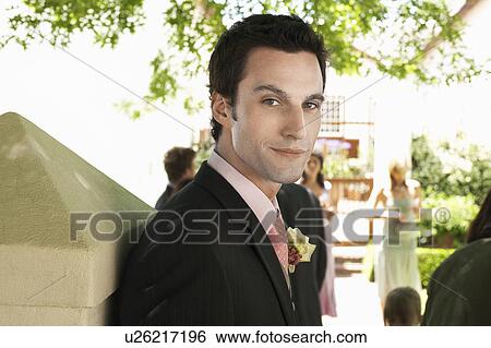 Mid adult man wearing tuxedo, portrait View Large Photo Image Stock Photograph - Mid adult man wearing tuxedo, portrait. Fotosearch