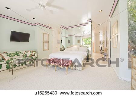 Minty fresh bedroom with leaf patterned sofa View Large Photo Image Stock Image - Minty fresh bedroom with leaf patterned sofa. Fotosearch
