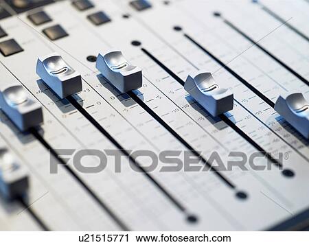 Stock Image - Mixing board, close-up. Fotosearch