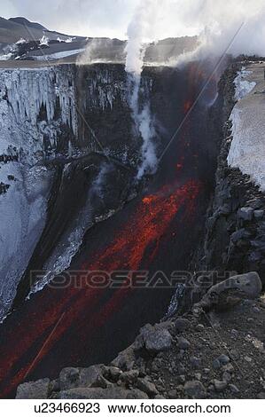 Stock Image - Molten lava and smoke of Eyjafjallajokull, Fimmvorduhals, Iceland. Fotosearch