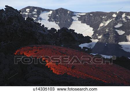 Stock Image - Molten lava flows from Mount Etna in Sicily, Val de Bove. Fotosearch