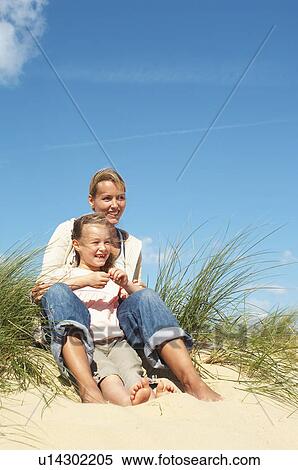 Mother and Daughter on Dunes View Large Photo Image Stock Photography - Mother and Daughter on Dunes. Fotosearch