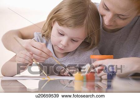 mother and saughter painting together View Large Photo Image Stock Photo - mother and saughter painting together. Fotosearch